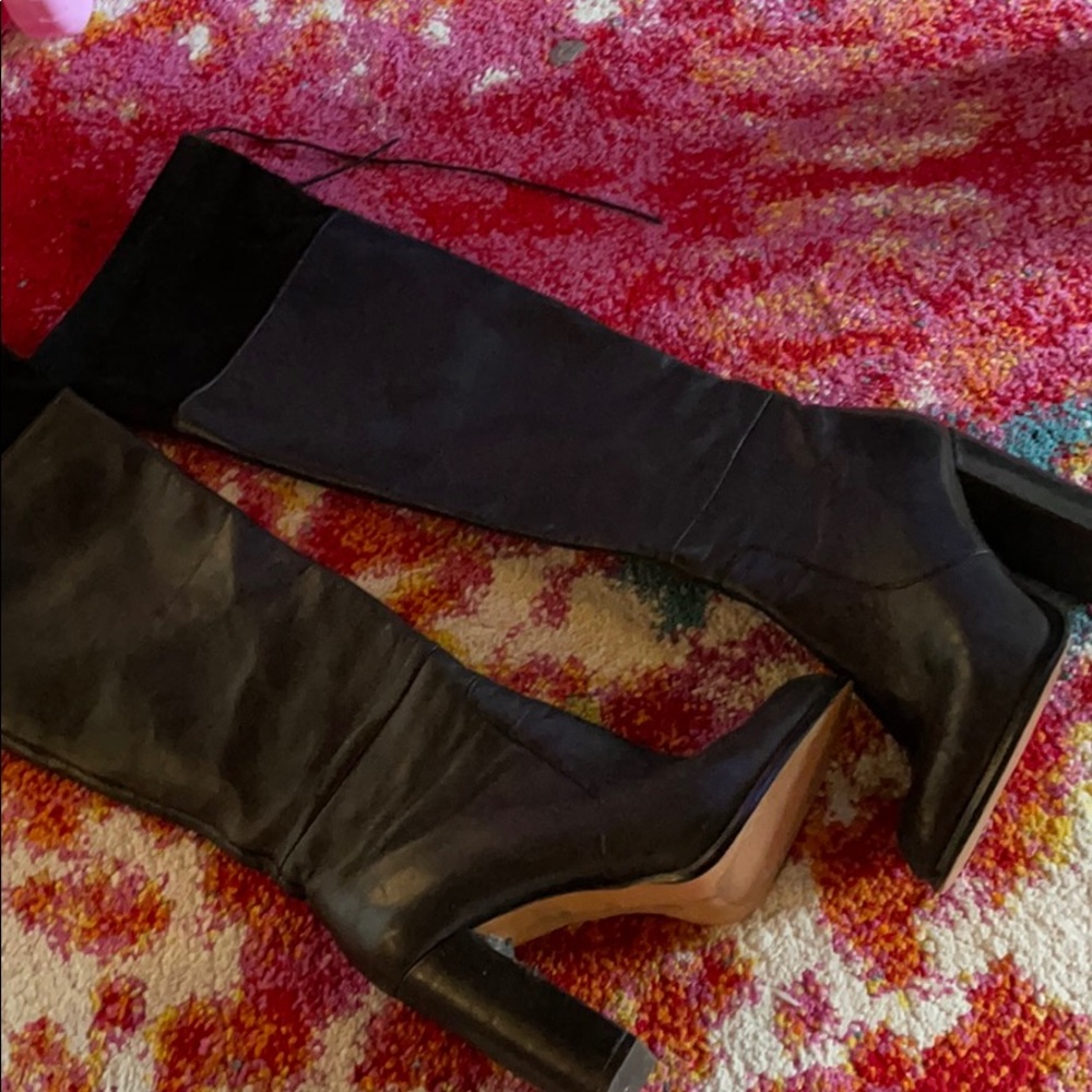 Black leather knee high boots
